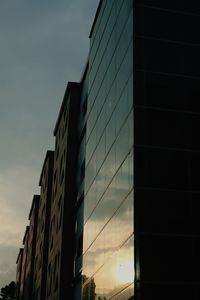 Low angle view of modern building against sky