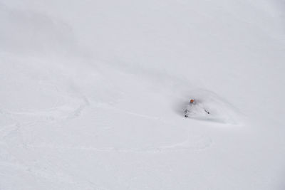 High angle view of person skiing in snow