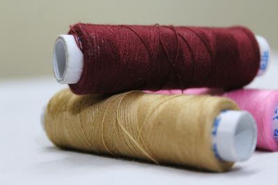 Close-up of stuffed wool thread on table