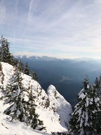 Scenic view of mountains against sky during winter