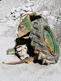High angle view of old abandoned car on field