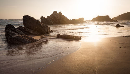 Scenic view of sea against sky during sunset