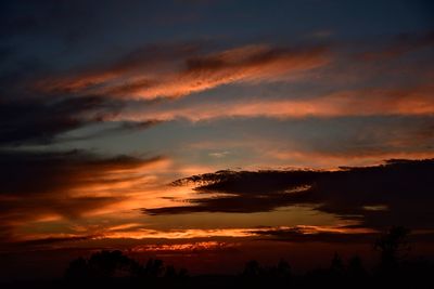 Low angle view of dramatic sky during sunset