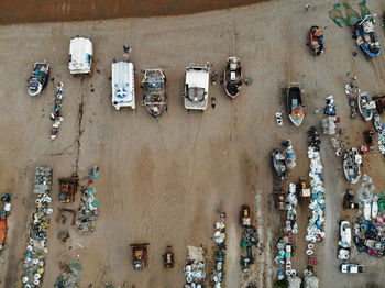 High angle view of nautical vessels and various objects on land