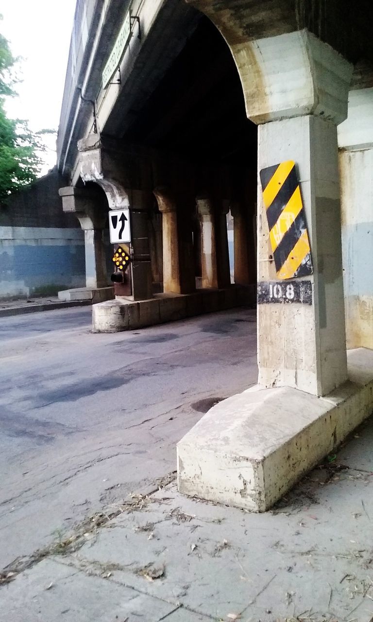 architecture, built structure, architectural column, building exterior, column, road, arch, pillar, bridge - man made structure, the way forward, day, outdoors, arched, diminishing perspective, long, no people, architectural feature, colonnade, bridge, empty road, archway, railway bridge