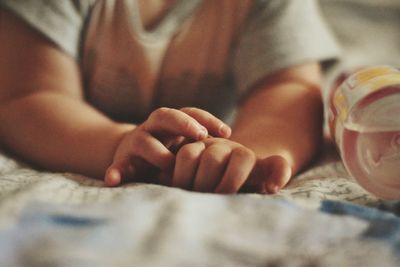 Extreme close up of baby holding hands