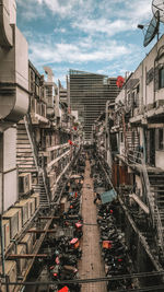 Panoramic view of buildings in city against sky