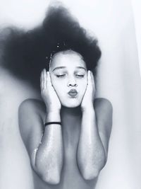 Directly above shot of girl in bathtub