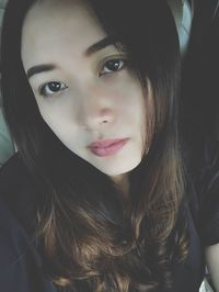 Close-up portrait of young woman