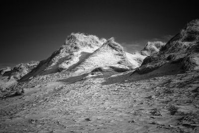 Scenic view of rocky mountains against sky