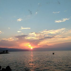 Scenic view of sea at sunset