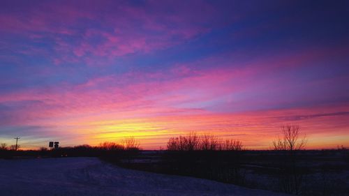 Scenic view of landscape at sunset