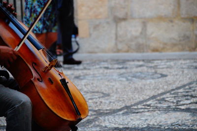 Man playing guitar on street