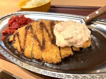 High angle view of meat in plate on table