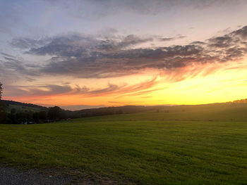 Scenic view of landscape against sky during sunset