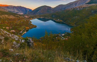 Panoramic view of scanno lake at sunrise,  its unique heart shape.