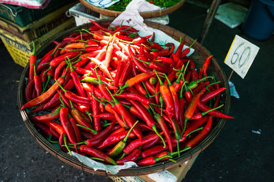 High angle view of red chili peppers for sale at market stall