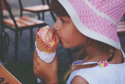 Close-up of girl holding ice cream cone