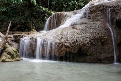 Scenic view of waterfall in forest