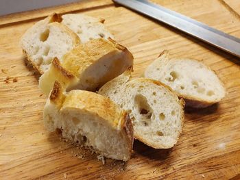 High angle view of bread on cutting board