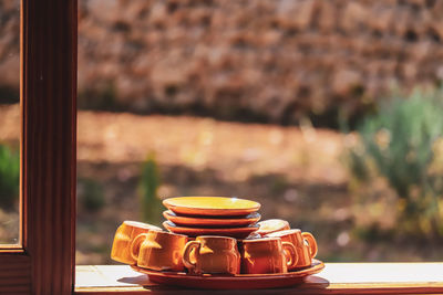 Close-up of coffee cup on table