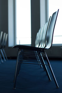 Close-up of empty chair on table