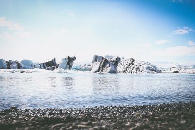 Scenic view of frozen sea against sky