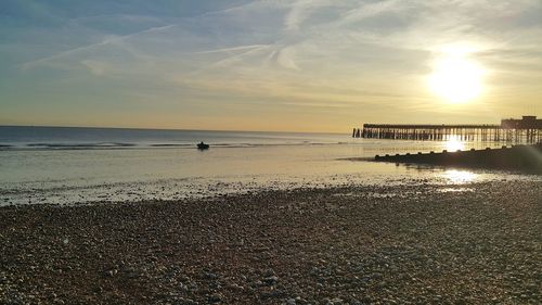 Scenic view of beach during sunset