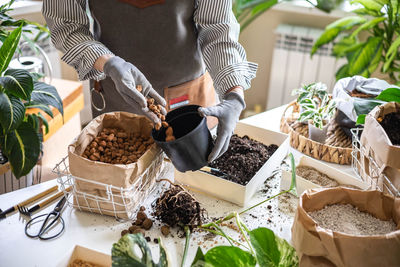 Midsection of man preparing food