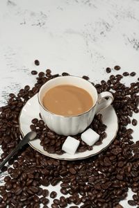 High angle view of coffee cup on table