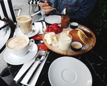 High angle view of breakfast served on table