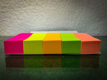 Colorful adhesive notes on table