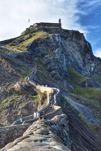 Scenic view of cliff against sky