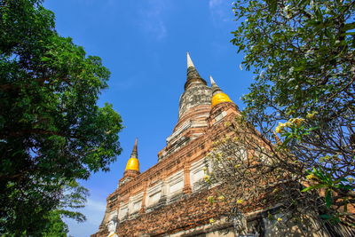 Low angle view of traditional building against sky