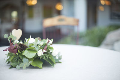 Close-up of white rose on table