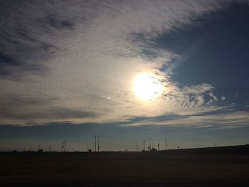 Scenic view of field against sky during sunset