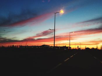 Scenic view of dramatic sky at sunset