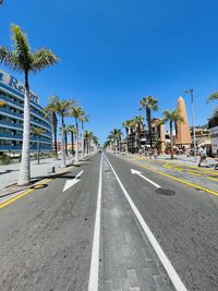 View of road against clear blue sky