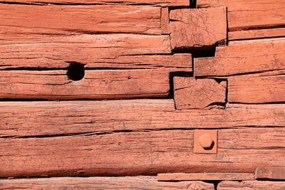 Full frame shot of a red colour wood wall