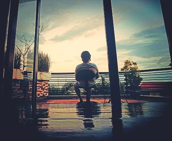 Silhouette of woman at sunset