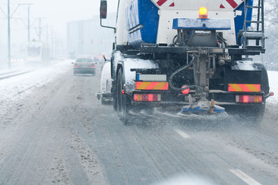 Vehicles on road in winter