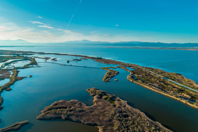 High angle view of sea against blue sky