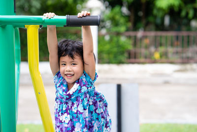 Portrait of smiling girl in playground