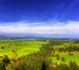 Scenic view of landscape against cloudy sky