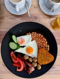 High angle view of breakfast served on table