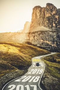 Scenic view of mountain road against sky