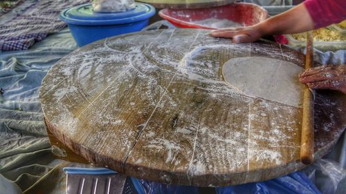 Close-up of person preparing food