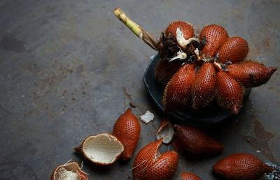 High angle view of snake fruits on table