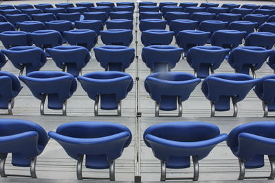 Full frame shot of blue chairs at stadium