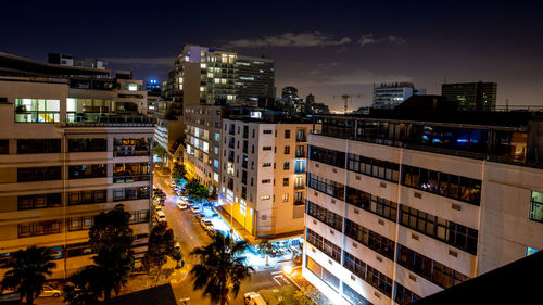 High angle view of illuminated buildings at night